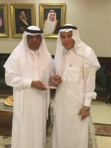 President of Umm Al-Qura University Dr. Bakri bin M'atooq bin Bakri Assas receives the CBHUK Excellence Award from Dr Meraj Mirza.